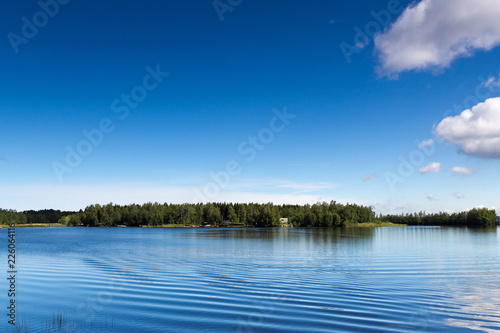 Fototapeta Naklejka Na Ścianę i Meble -  Finnish lake view with blue sky