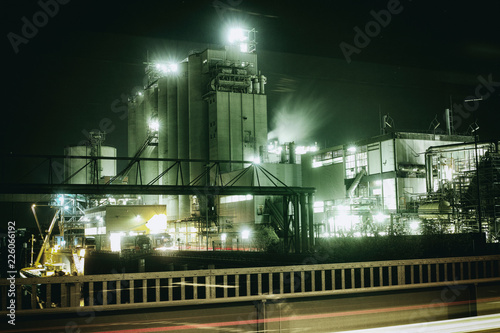 Oil refinery in Mannheim, Germany, europe petrochemical industry night scene scrap metal vintage