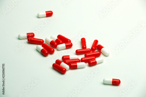 red pills isolated on white background