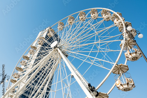 Ferris wheel with blue sky