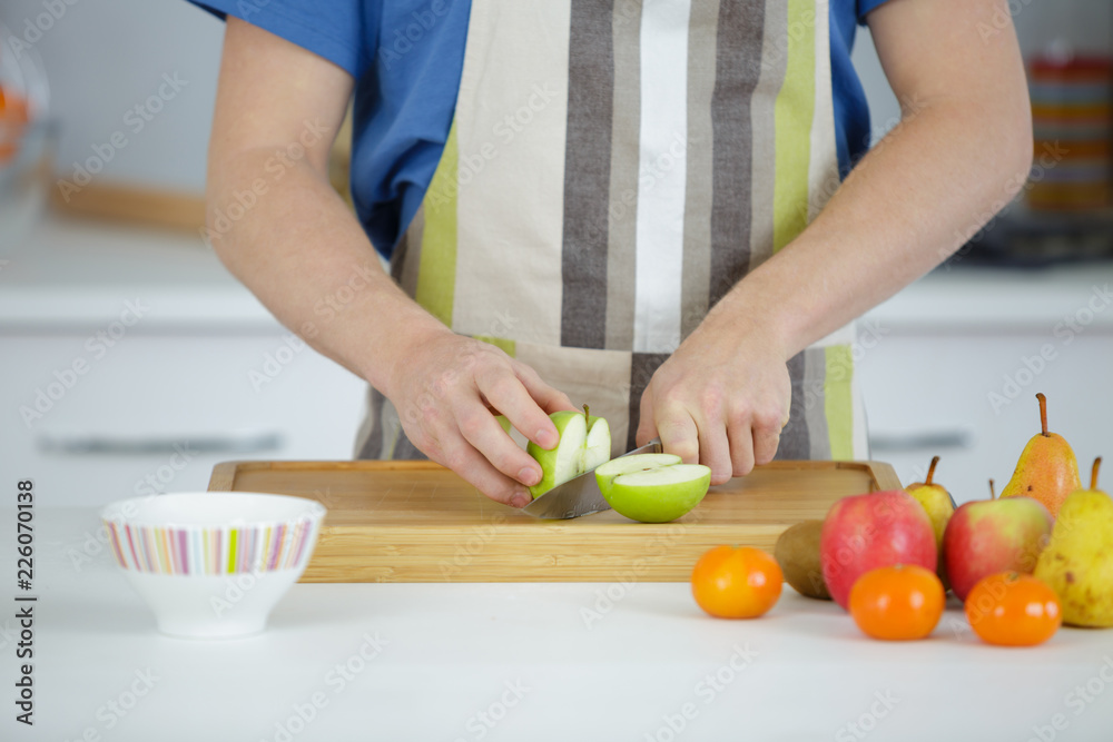 man cutting apples man cutting apples