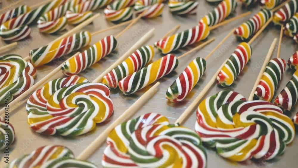 Christmas sweet caramel canes, traditional lollipop candies