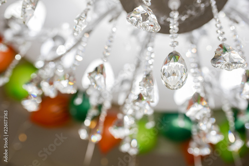 Close up on crystal of contemporary chandelier © Aleksandr Kolesnikov