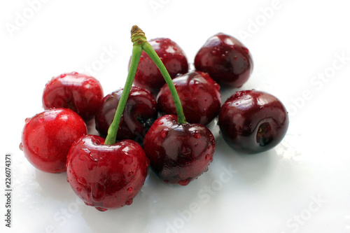 cherry ripe on a light background, closeup , berry of the season