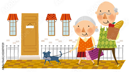 Elderly couple arriving home from shopping