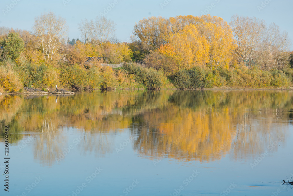 Autumn landscape lake. Lake at sunset. Yellow foliage Autumn landscape lake. Lake at sunset. Yellow foliage