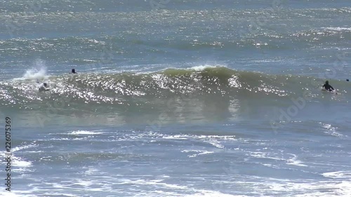 Unidentified surfers at Ano Nuevo State Park, Santa Cruz County, California, USA, 2018 photo