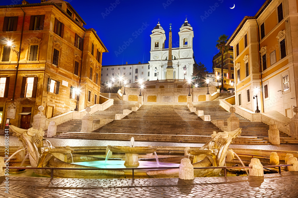The Spanish Steps and the Fontana della Barcaccia in Piazza di Spagna in Rome at night