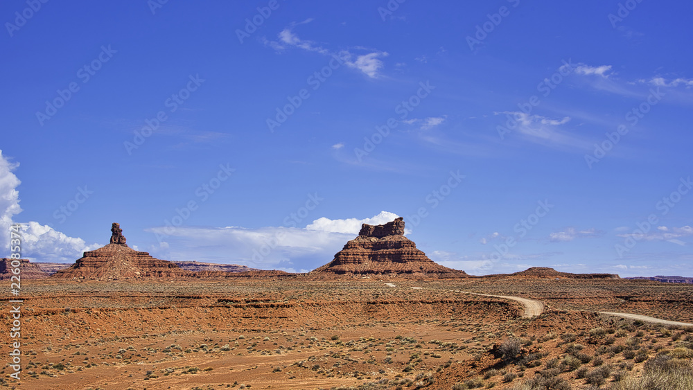 Buttes on a desert on blue sky background Buttes on a desert on blue sky background