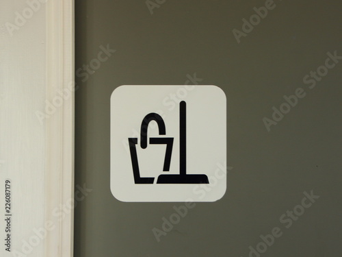 Closeup Cleaning Icon on Entrance to Closet