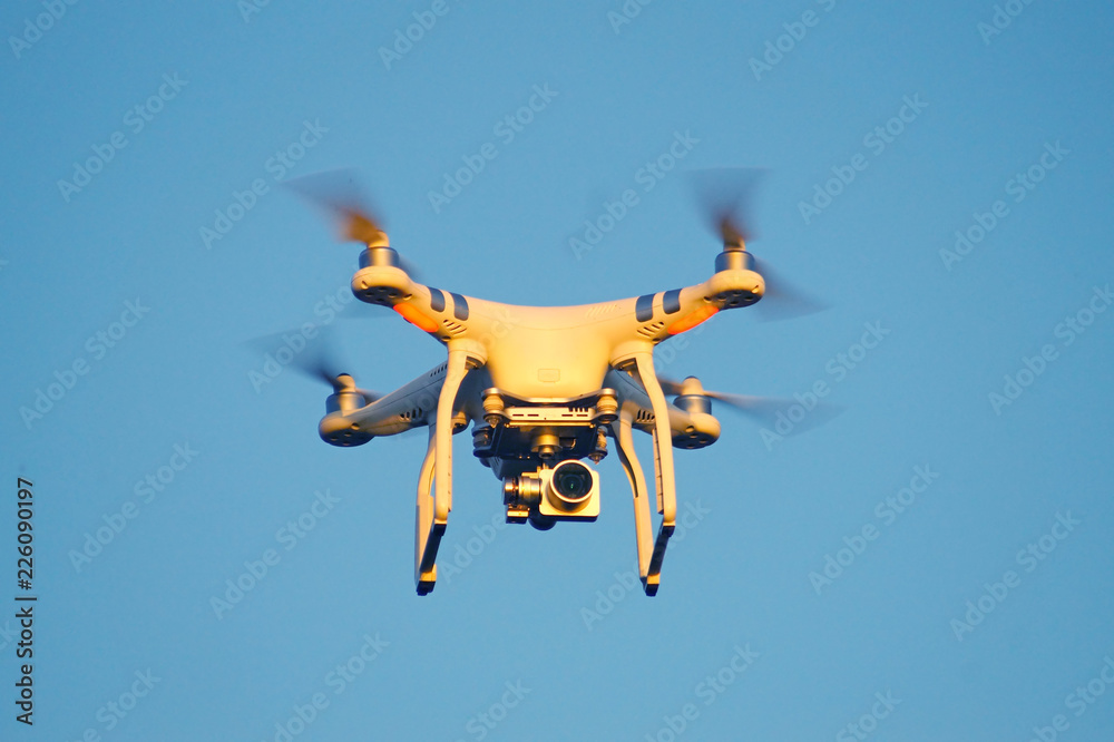 Drone quadcopter with digital camera.