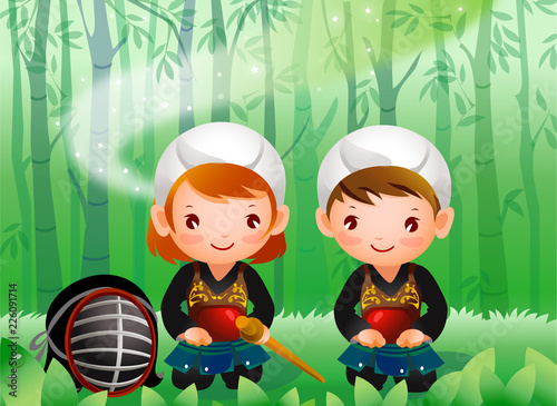 Portrait of a boy and a girl wearing kendo uniform sitting in the forest
