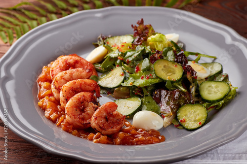 Healthy salad with grilled shrimps