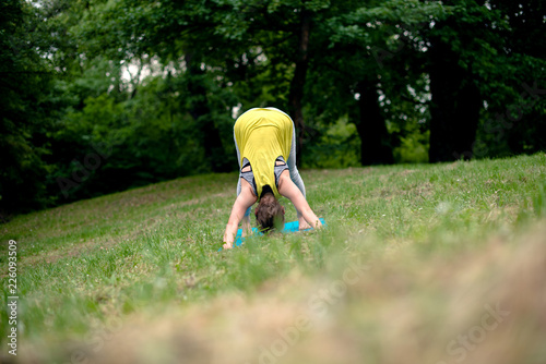 Young woman exercing in nature photo