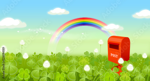 Mailbox in a field with a rainbow in the background