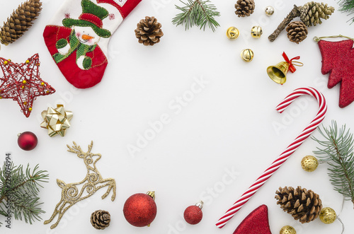 christmas frame. Red, gold and green christmas decoration on white background top view flat lay mockup. Xmas 2019 photo