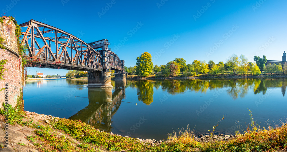 Old Town Railway Bridge in Magdeburg, Elbe river and downtown at Autumn