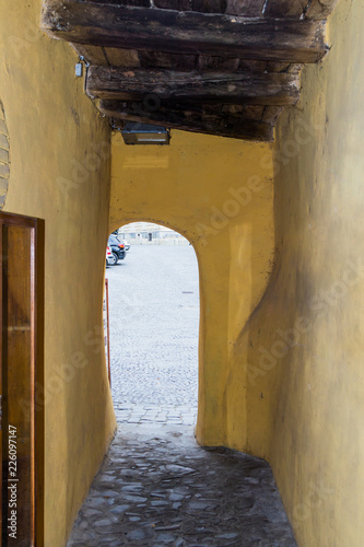 The Street of  the Trustee - Cositorarilor street -  in old city Sighisoara in Romania photo