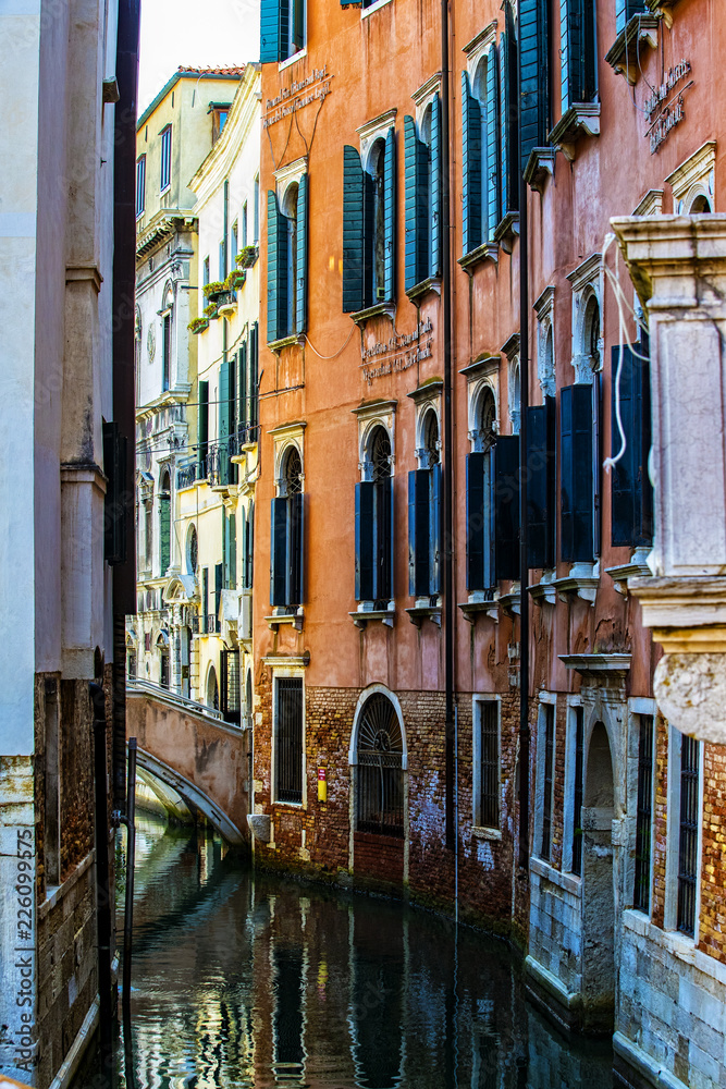 Elements of architecture of houses on the streets of the canals of the city of Venice in Italy.