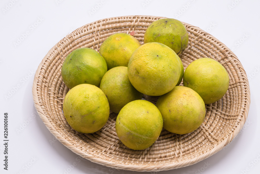 Fresh green and yellow lime on white background. Fresh green and yellow lime on white background.