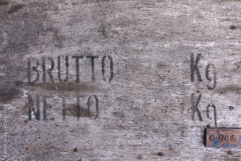 Letters on old chest for product weight, wood texture Letters on old chest for product weight, wood texture