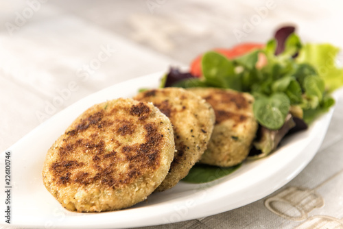 Vegetable patty with salad photo