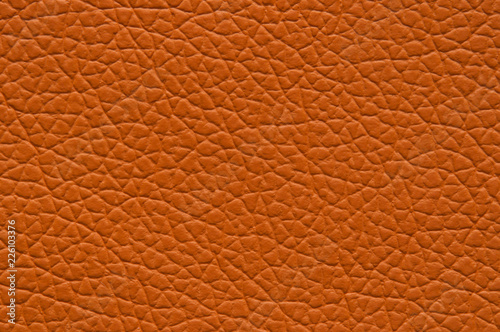 Bright orange artificial leather with large texture.