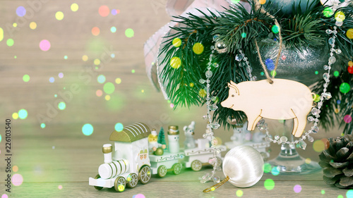 Натюрморт новогодняя открытка, свинья символ 2019 года, паровозик, игрушка, елка, шишка