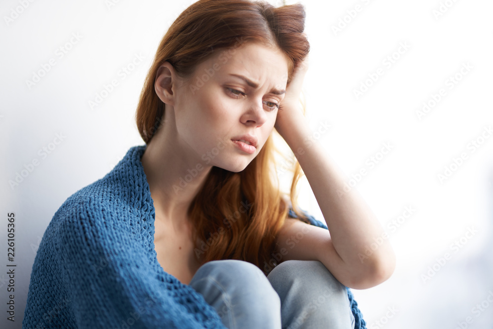 woman holding her head sadness depressed house window woman holding her head sadness depressed house window