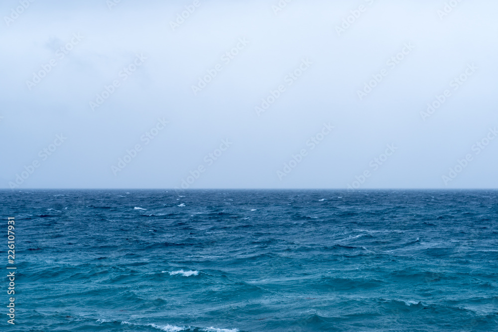 Wide view of arctic ocean near Tromso Norway at a cold and windy winter day