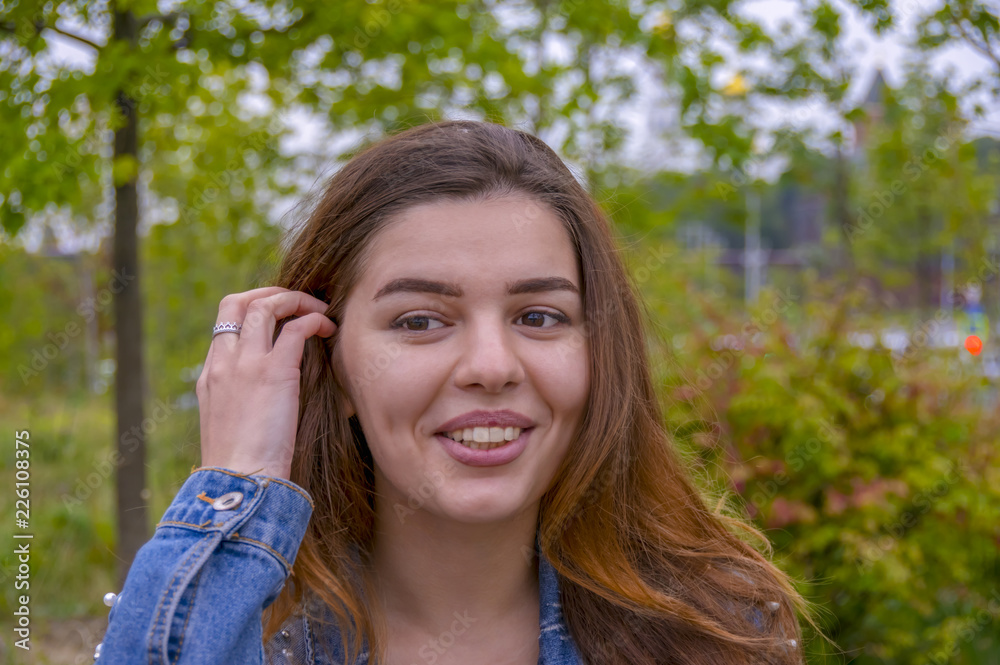 Girl in the Park. Portrait of young woman Girl in the Park. Portrait of young woman