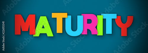 Maturity - overlapping multicolor letters written on blue background photo