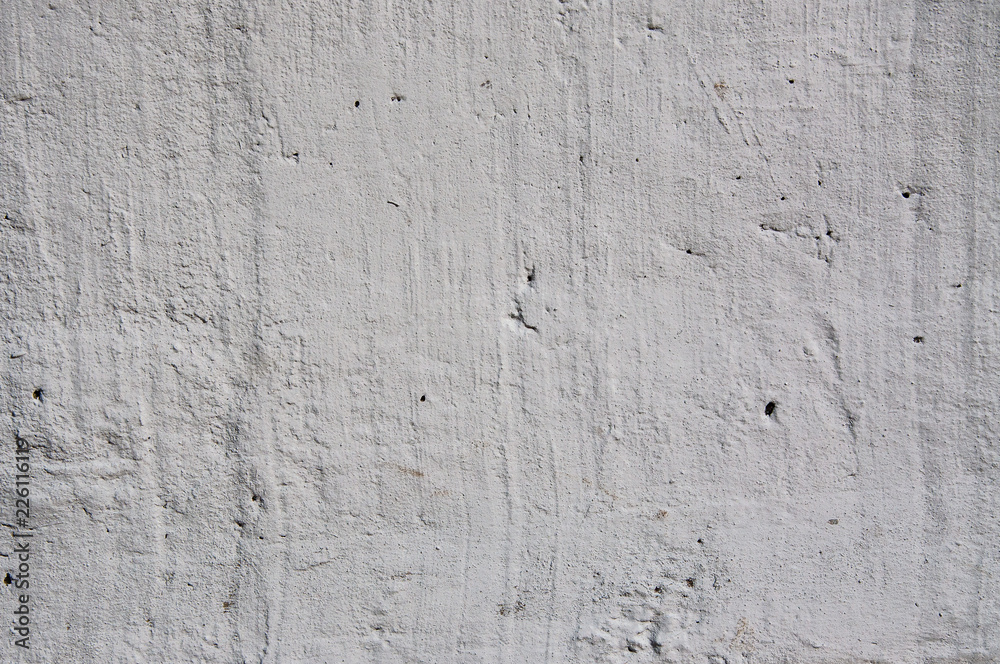 background gray color textured concrete wall, natural daylight