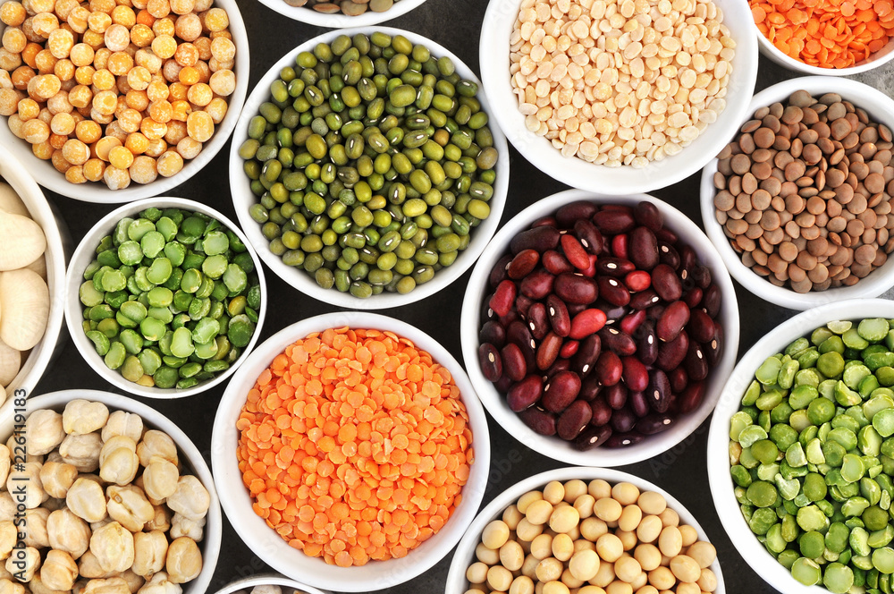 Mix of dry legume varieties: pinto and mung beans, assorted lentils, soyabean, yellow and green peas, chickpea; vegan high protein food for healthy diet Mix of dry legume varieties: pinto and mung beans, assorted lentils, soyabean, yellow and green peas, chickpea; vegan high protein food for healthy diet