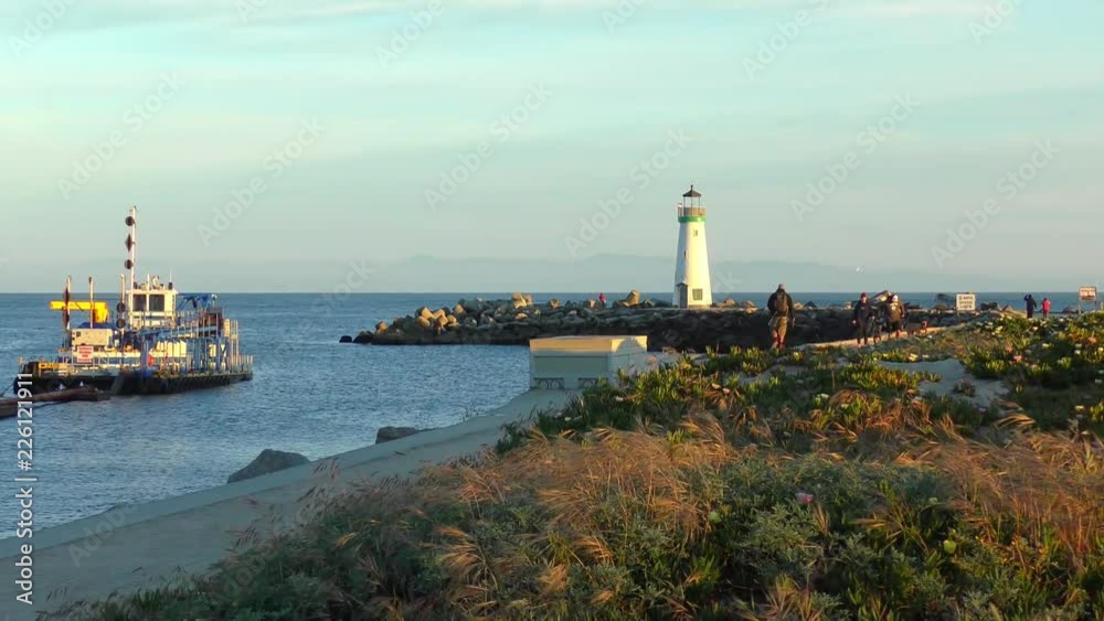 The Santa Cruz Breakwater (aka Walton) Lighthouse at sunset, in Santa Cruz, California, USA, circa April 2017 The Santa Cruz Breakwater (aka Walton) Lighthouse at sunset, in Santa Cruz, California, USA, circa April 2017
