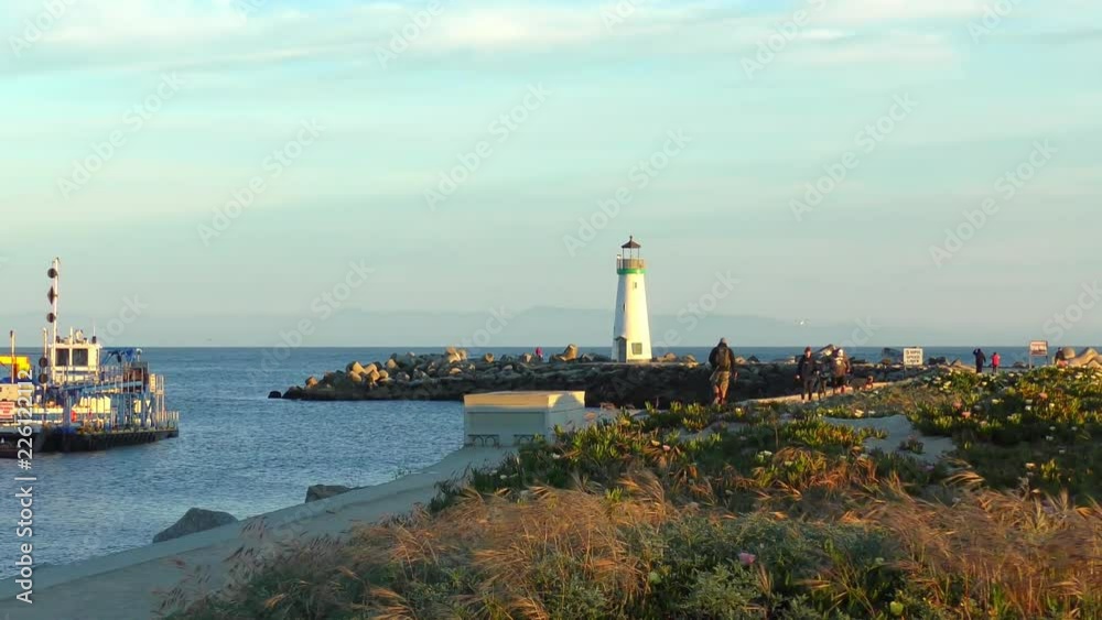 The Santa Cruz Breakwater (aka Walton) Lighthouse at sunset, in Santa Cruz, California, USA, circa April 2017 The Santa Cruz Breakwater (aka Walton) Lighthouse at sunset, in Santa Cruz, California, USA, circa April 2017