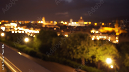 Blurred background plate of Florence, Italy cityscape at night for compositing