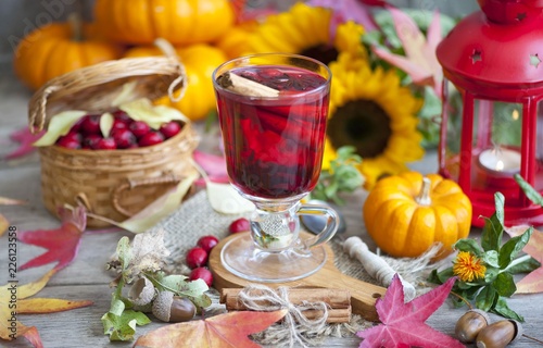 hot winter or autumn drink with spices and wild rose berries, mulled wine, hot wine