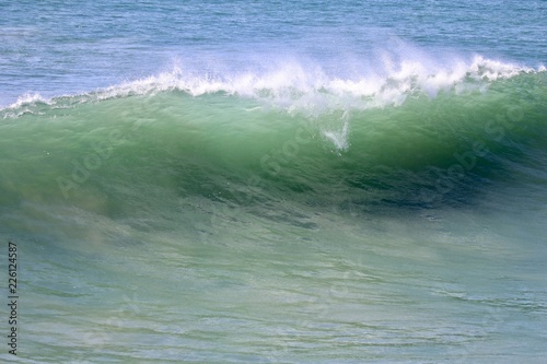 Large empty wave crashing in the ocean 