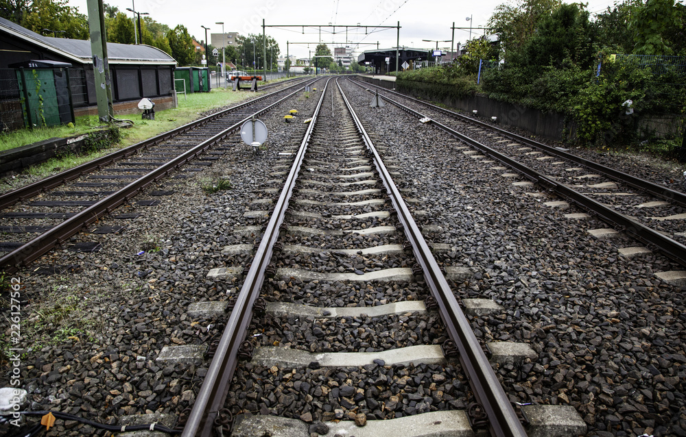 Train tracks in a station Train tracks in a station