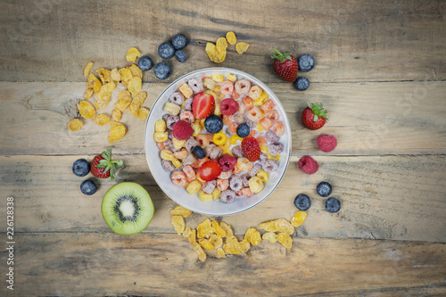 Bowl of cereal and berries on the table