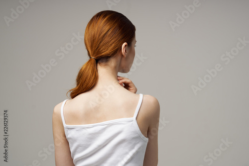 woman stands with his back to the camera health