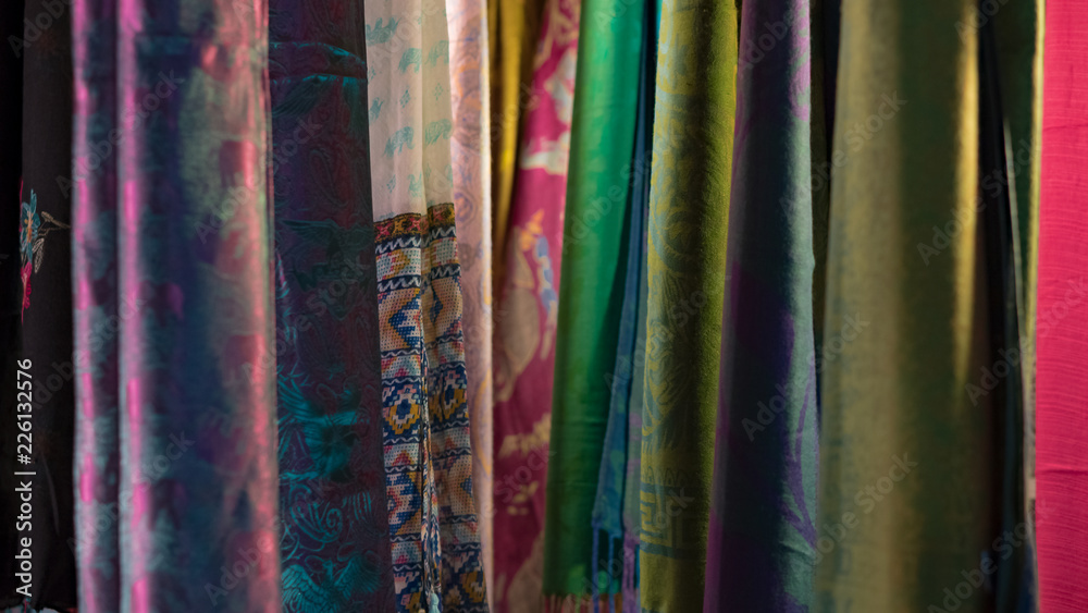 The colorful fabric is the background.