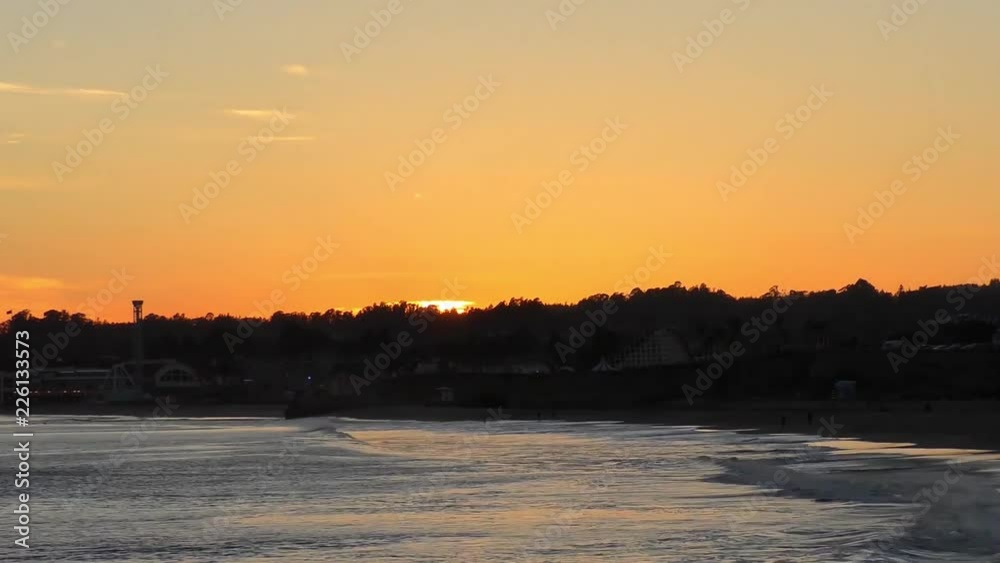 The Pacific Ocean at the Santa Cruz Breakwater (aka Walton) Lighthouse at sunset, in Santa Cruz, California, USA, circa April 2017 The Pacific Ocean at the Santa Cruz Breakwater (aka Walton) Lighthouse at sunset, in Santa Cruz, California, USA, circa April 2017