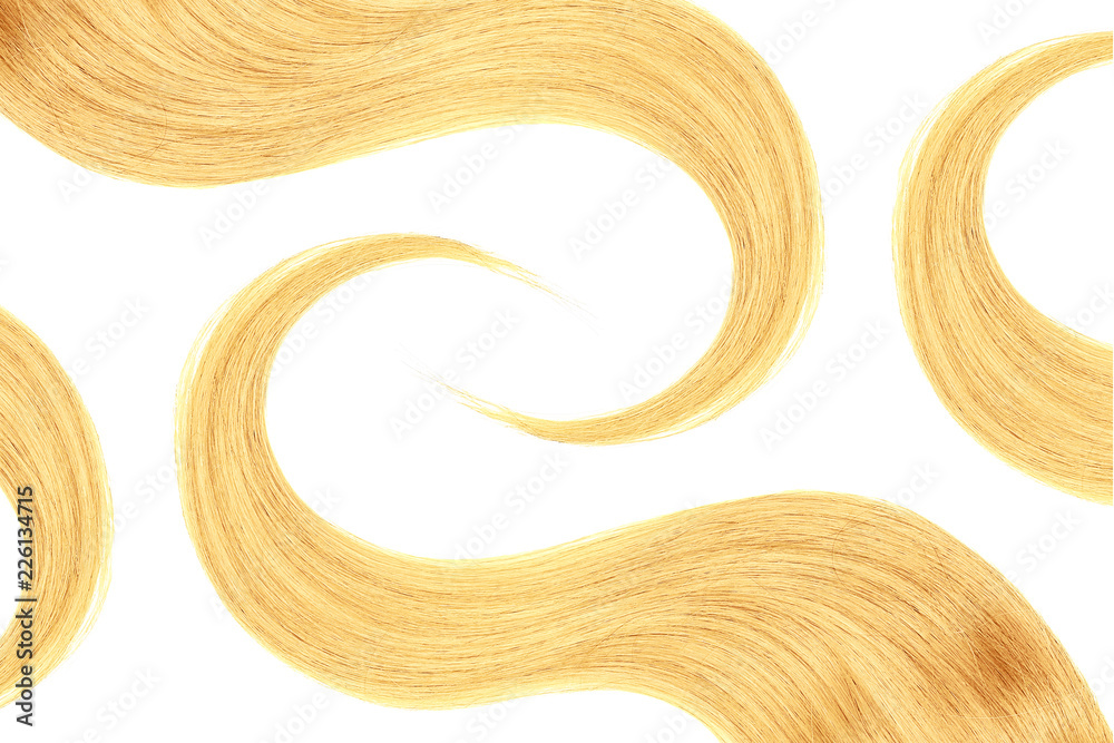 Blond hair isolated on white background. Long wavy ponytail Blond hair isolated on white background. Long wavy ponytail