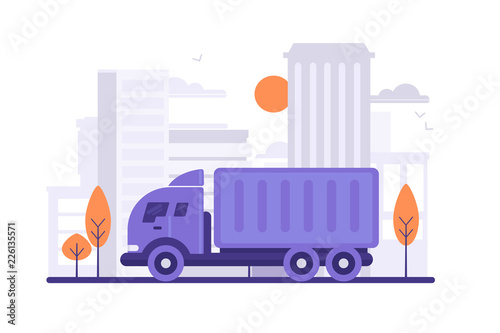 Truck is carrying things on city background.