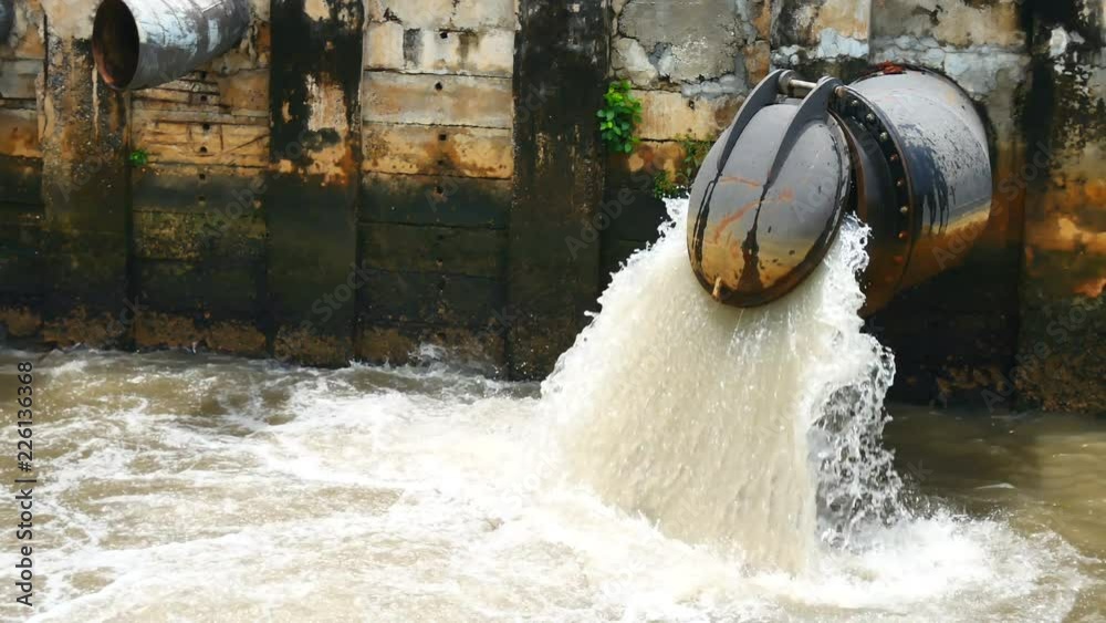 custom made wallpaper toronto digitalEnvironmental Video After a heavy rain the sewer system of the big city is draining through wastewater treatment into the canal through the drain door to prevent flooding and Environmental protection.