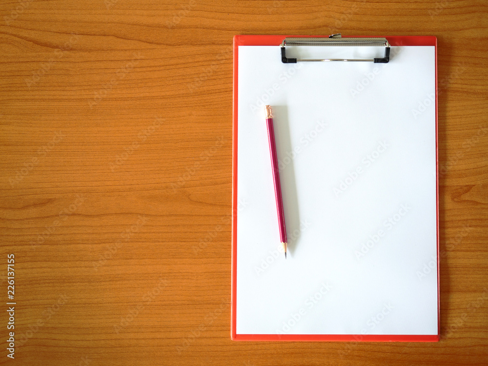 Blank paper and pencil on clipboard. Blank paper and pencil on clipboard.