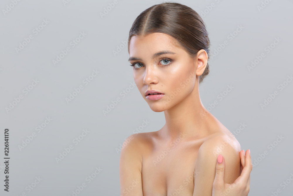 Naklejka premium Beautiful young woman with perfect skin.