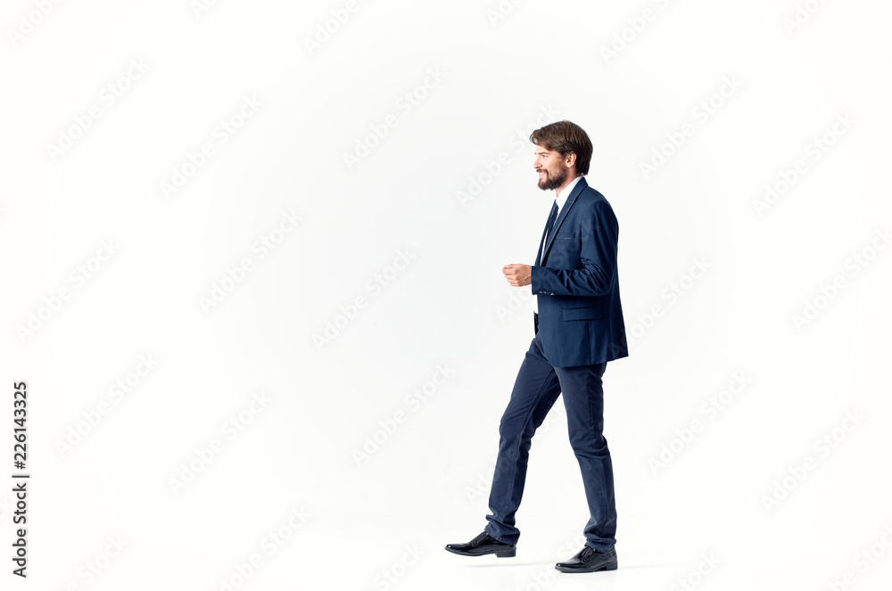 business man with a beard goes on isolated background business man with a beard goes on isolated background